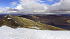 View from the top of Stob Coire Easain showing surrounding mountains and Loch Treig.