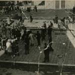 Weapons surrendered by the Germans are strewn across Mirano Square, 29th April 1945. Civilians and partizans look on. Leo Pavan, a civilian living on Mirano, was the photographer. Weapons surrendered by the Germans are strewn across Mirano Square, 29th April 1945. Civilians and partizans look on. Leo Pavan, a civilian living on Mirano, was the photographer.