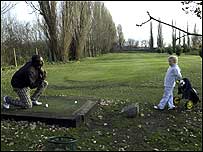 Linford Christie golfing with Sammy Fuller