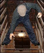 Picture: Model of worker balancing on loves in the smoke shed.