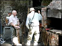 Guide Nick Southwick in the blacksmith's shop