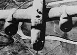 A Mitchell B-B25 of the Avenger group, USAAF, heads for home after bombing German communications in Italy