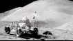 David R. Scott, Commander of Apollo 15, works at the Lunar Roving Vehicle