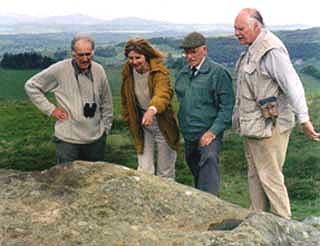 Looking at a Cup Mark on a tri - radial cairn