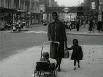 Woman and daughter in London in the 50s