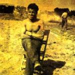 Donald Delves sitting on a chair from one of the blown up buildings half way between Salerno and Naples Donald Delves sitting on a chair from one of the blown up buildings half way between Salerno and Naples