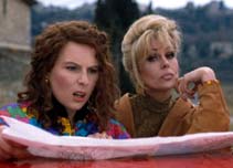 Edina and Patsy from Absolutely Fabulous read a map
