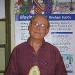 Donald Wharf holding a picture of himself from 1940, summer 2003