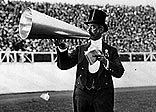 The City Toastmaster makes an announcement to the crowd