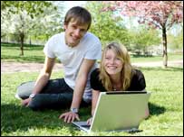 Using a laptop in the park