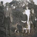 Two of the evacuees with Marsh's parents on the farm in Withington.