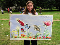 Girl with her pavement art.