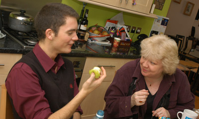 Glyn and Di have a snack