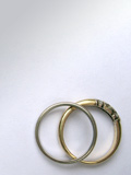 Two wedding rings touching