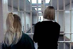 Image: Women & Female Guard in Maximum Security Prison