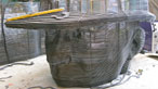 Image of the head of the Six Bells memorial under construction
