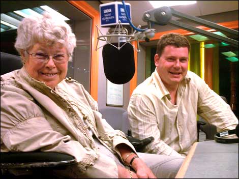 Man and a woman in radio studio
