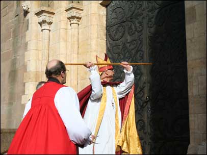 Bishop of Worcester beats on the cathedral door