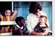 Sister, Marguerite, Kageha and Jeremy with their mother, Theresa