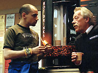 clint and Len drink coffee