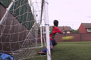 Mahamud takes the video camera to one of the coaching sessions.