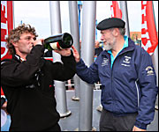 Sir Robin shares Champagne with bernard Stamm