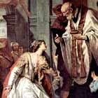Lucy, a young woman dressed in white, receiving communion from a priest