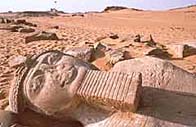 Image of the fallen head of a statue of Ramesses
