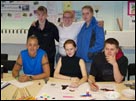 Young people at a desk