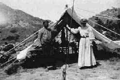 Photograph shows Gertrude Bell and Fattuh in June 1907 at their camp in Deghile, Turkey. Image courtesy of The Gertrude Bell Project at the University of Newcastle upon Tyne Library.