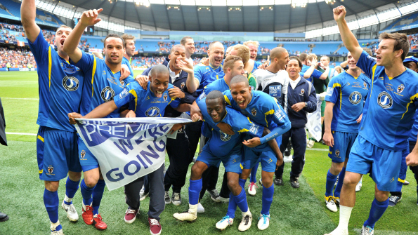 Supporters Direct and Dave Boyle worked closely with AFC Wimbledon to assist the club in getting promotion to the Football League. Photo: PA