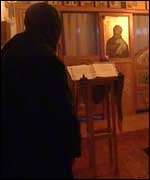 A nun praying