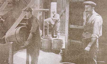 men with barrels