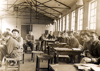 Inside one of the workshop huts
