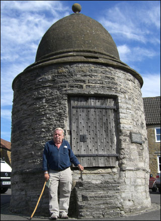 man outside roundhouse in Castle Carey