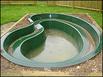 An empty pond - soon to be filled