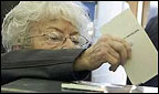A woman casts her vote, photo: AP