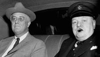 British Prime Minister Winston Churchill arrives at the White House with US President Franklin D. Roosevelt at the start of the Second Washington Conference