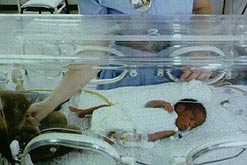 Image: nurse and premature baby