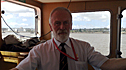 Stuart on the bridge of a ship