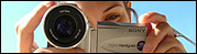 A woman with a video camera