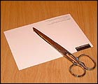 Picture: postcard and scissors