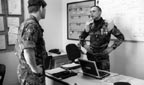 A British marine working with French marines