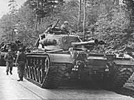 American tanks on alert in the Berlin Grunewald, West Germany, as the crisis over the Cuban blockade looms during the Cuban missile crisis (25th October 1962)