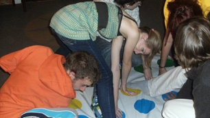 Lee playing Twister