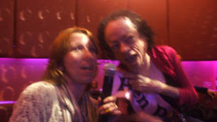Liz Carr singing karaoke