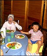 Rui Rui enjoys a family dinner