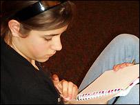 A member of the youth group working on the project