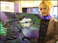 Artist Juliet with one of her stunning paintings