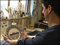 Paul admires a newly finished plate